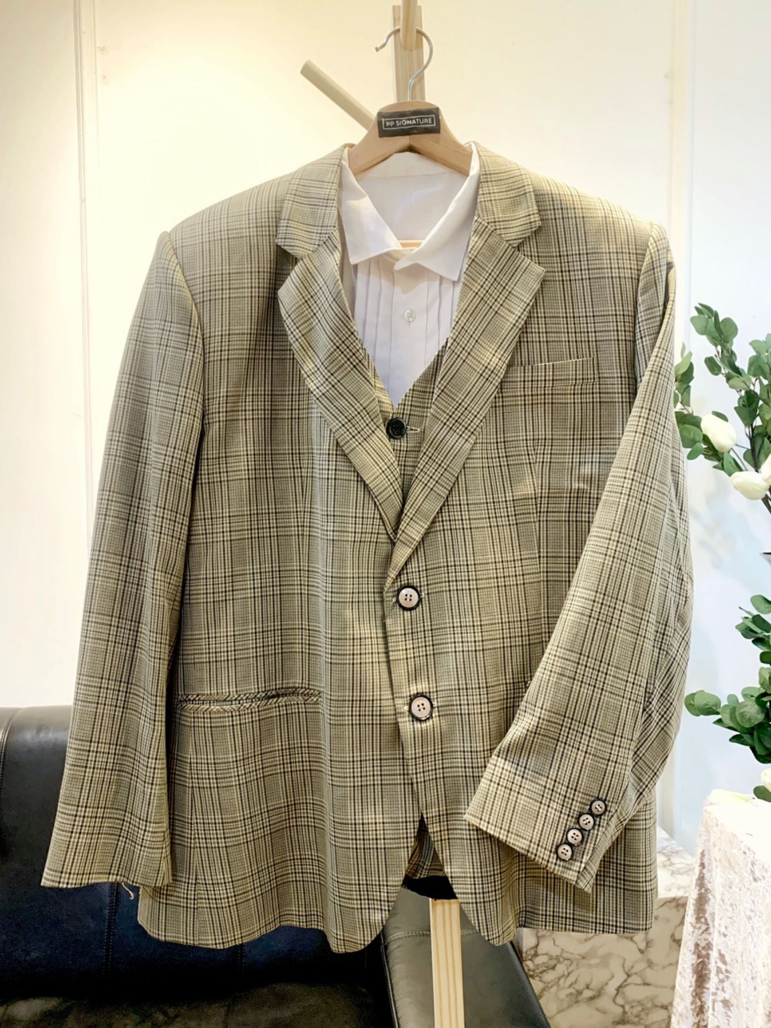 Redefine wedding elegance with our Light Brown Checked 3 Piece Suit. A perfect fusion of style and charm that's sure to leave a lasting impression.