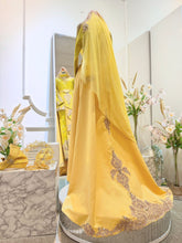 Make your wedding dreams a reality with PP Signature's TUN RAHAH - Baju Pengantin Yellow Champagne Songket Two-Piece Dress with Pants/Skirt and Detachable Trail Malay wedding dress rental.