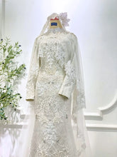 Close-up of songket bodice showing Off White texture and cape attachment-Detail shot used for PP Signature Bridal Sewa Baju Sanding listings