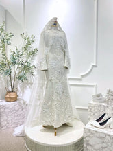 Off White Songket Baju Sanding Perempuan with detachable cape from PP Signature Bridal-Front view showing textured songket and elegant silhouette for Sewa Baju Sanding