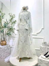 Off White Songket Baju Sanding Perempuan with detachable cape from PP Signature Bridal-Front view showing textured songket and elegant silhouette for Sewa Baju Sanding