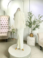 Searching for a Baju Nikah? Rent our ARABELLE pearl white bridal satin pencil dress, a classic and elegant wedding set with a matching Baju Melayu Moden.