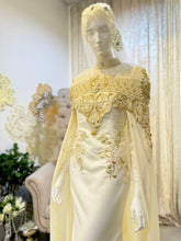 AURORA Essential Duchess Creamy Gold Bridal Ensemble: Bride's dress with detachable cape, Groom's Kot Raihan 3pcs. Timeless elegance.