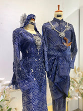 Elegant Malay Wedding Ensemble with a Modern Touch