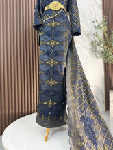 Kualiti tekstur fabrik songket 3D navy blue gold pada baju nikah sanding BIDASARI untuk pilihan sustainable wedding fashion di majlis perkahwinan Malaysia