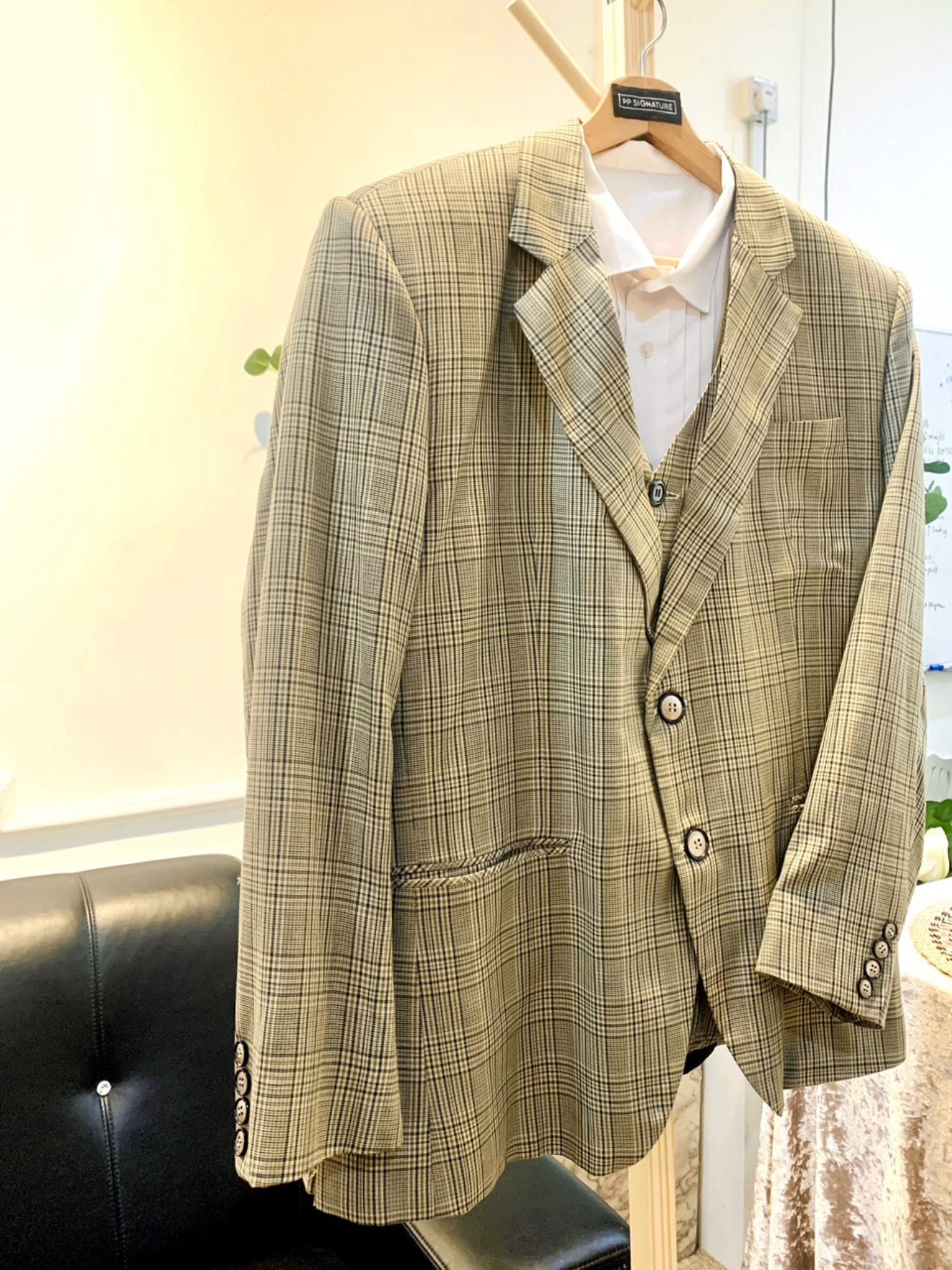 Redefine wedding elegance with our Light Brown Checked 3 Piece Suit. A perfect fusion of style and charm that's sure to leave a lasting impression.