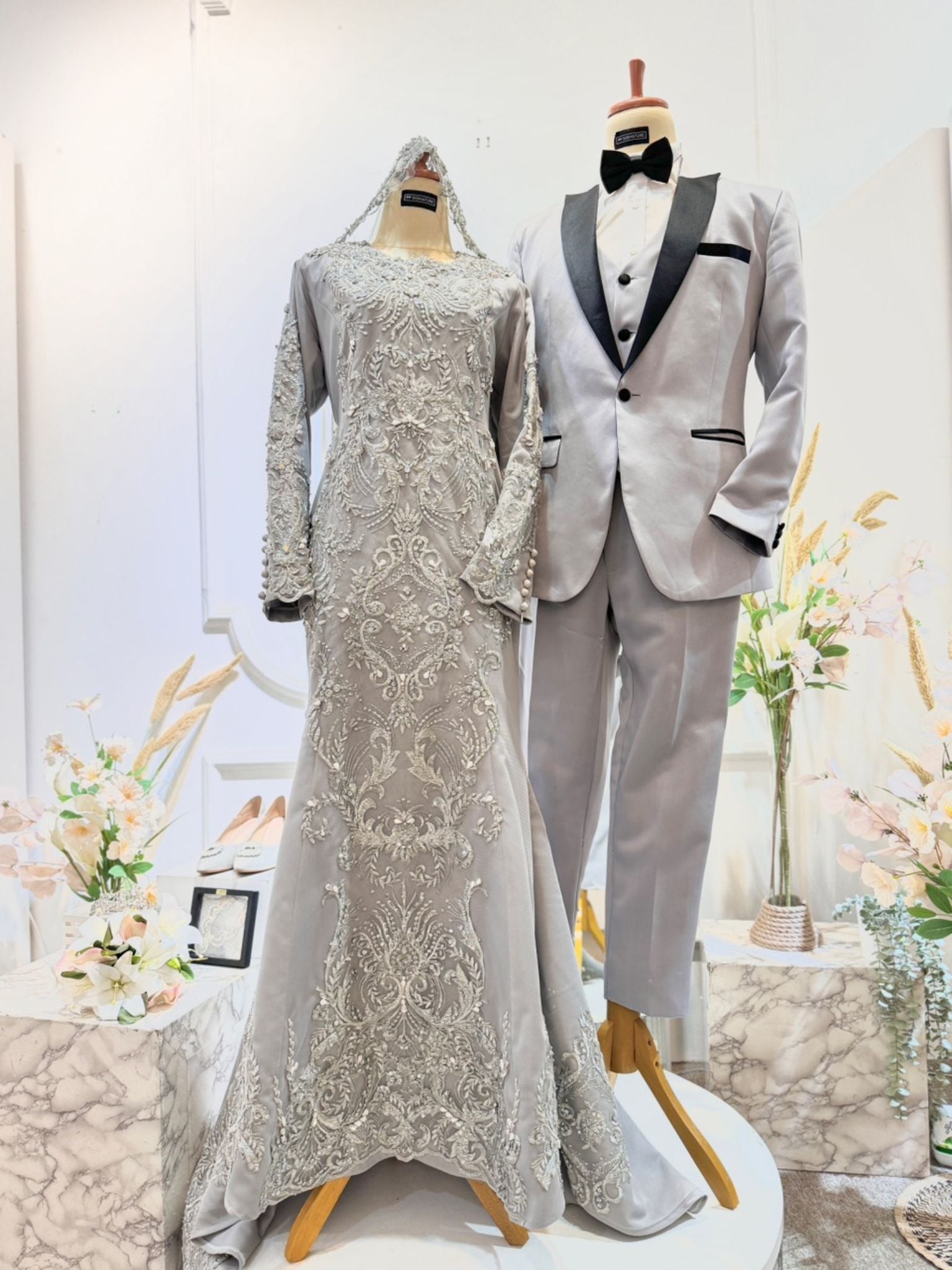LUMIERE - Silver Grey Duchess Trumpet Dress with Lace - A stunning Baju Pengantin for Malay Weddings, featuring a trumpet dress design in elegant silver grey. Crafted from luxurious duchess fabric embellished with intricate lace detailing. Perfect for weddings and formal occasions.