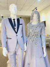 Madeleine is a stunning silver grey glitter lace ballgown muslimah dress that is perfect for the modern bride. With its elegant design and flattering fit, Madeleine is sure to turn heads on your big day. Made from luxurious glitter lace and organza, this dress is the perfect way to celebrate your special day.