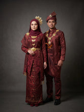 Real bride and groom wearing MAISARA maroon songket 2D kebaya set for Malay wedding