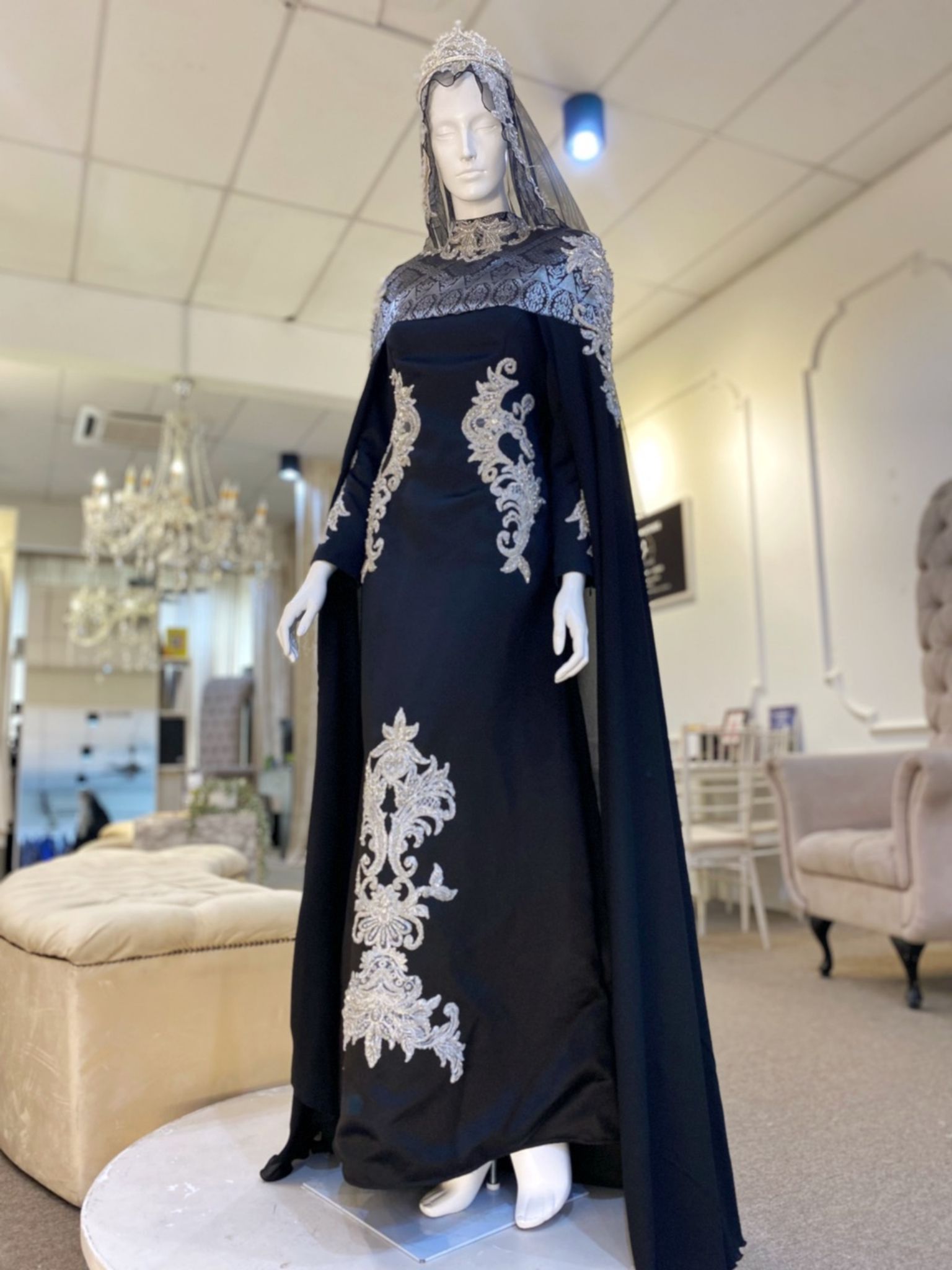 MALEFICENT - Baju Sanding Black A-Line Wedding Dress with Detachable Cape | Photos of beautiful baju sanding that is perfect for a traditional yet stylish wedding day. The black color is both elegant and versatile, and the intricate embroidery and lacework make it a truly unique and eye-catching garment. This baju sanding is sure to turn heads on your big day.