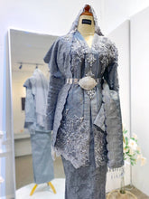 Silver & Dark Grey Songket Kebaya with Selempang Sulam (Bride) Kot Raihan Two-piece Suit (Groom) Songket 2D Fabric Sizes: Bride (M-XL) | Groom (S-L) Perfect for Malaysian Wedding Reception (Baju Sanding)