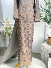 Luxury wedding gown rental Malaysia-Groom’s Kot Raihan suit for weddings-Elegant Baju Sanding for reception-Songket bridalwear with Javanese touch-Exclusive wedding dress for Malay brides