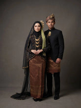 Real bride and groom wearing NILAKANDI black maroon kebaya kutubaru and beskap suit set