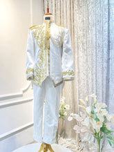 Considering an off-white wedding suit? Explore the elegance and versatility of the prince suit with gold embroidery. Find inspiration now!