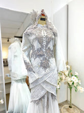 PALOMA Baju Sanding Tradisional Off White Songket Two-Piece Tulip Dress by Butik Pengantin PP Signature. A beautiful blend of tradition and elegance, featuring luxurious Songket 2D fabric in off-white with silver detailing