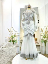 PALOMA Baju Sanding Off White Songket Two-Piece Tulip Dress from Butik Pengantin PP Signature, pakej perkahwinan. Featuring premium Songket 2D fabric with silver accents for a classic wedding reception look.