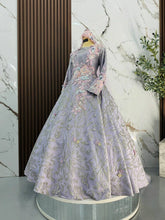 PERIWINKLE bride upper body close-up showing glitter lace details on purple silver Duchess fabric