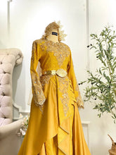 Close-up of Baju Pengantin top showing 3D songket texture and metallic gold detailing-Sewa Baju Sanding