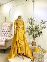 Bride’s modern Baju Pengantin Perempuan with 3D songket weaving and graceful trail-Pakej Perkahwinan