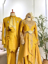 Close-up of Baju Pengantin couple in mustard gold songket with elegant Malay accessories-Detailed view of songket texture and Kot Raihan suit for pengantin lelaki and perempuan