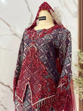 Bride wearing maroon songket 3D dress with sewn-in trail for indoor wedding reception PP Signature Kajang