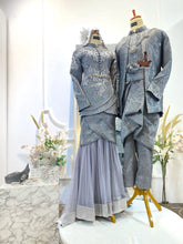 SALLY Baju Pengantin songket set in dark grey and silver for modern Malay bride and groom-Couple in coordinated grey Baju Sanding and Kot Raihan for elegant wedding reception