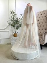 SHELLY - Light Peach & Cream Songket 3D Baju Pengantin from Butik Pengantin PP Signature. A stunning two-piece wedding dress with a detachable shoulder cape, perfect for a traditional Malay wedding reception.