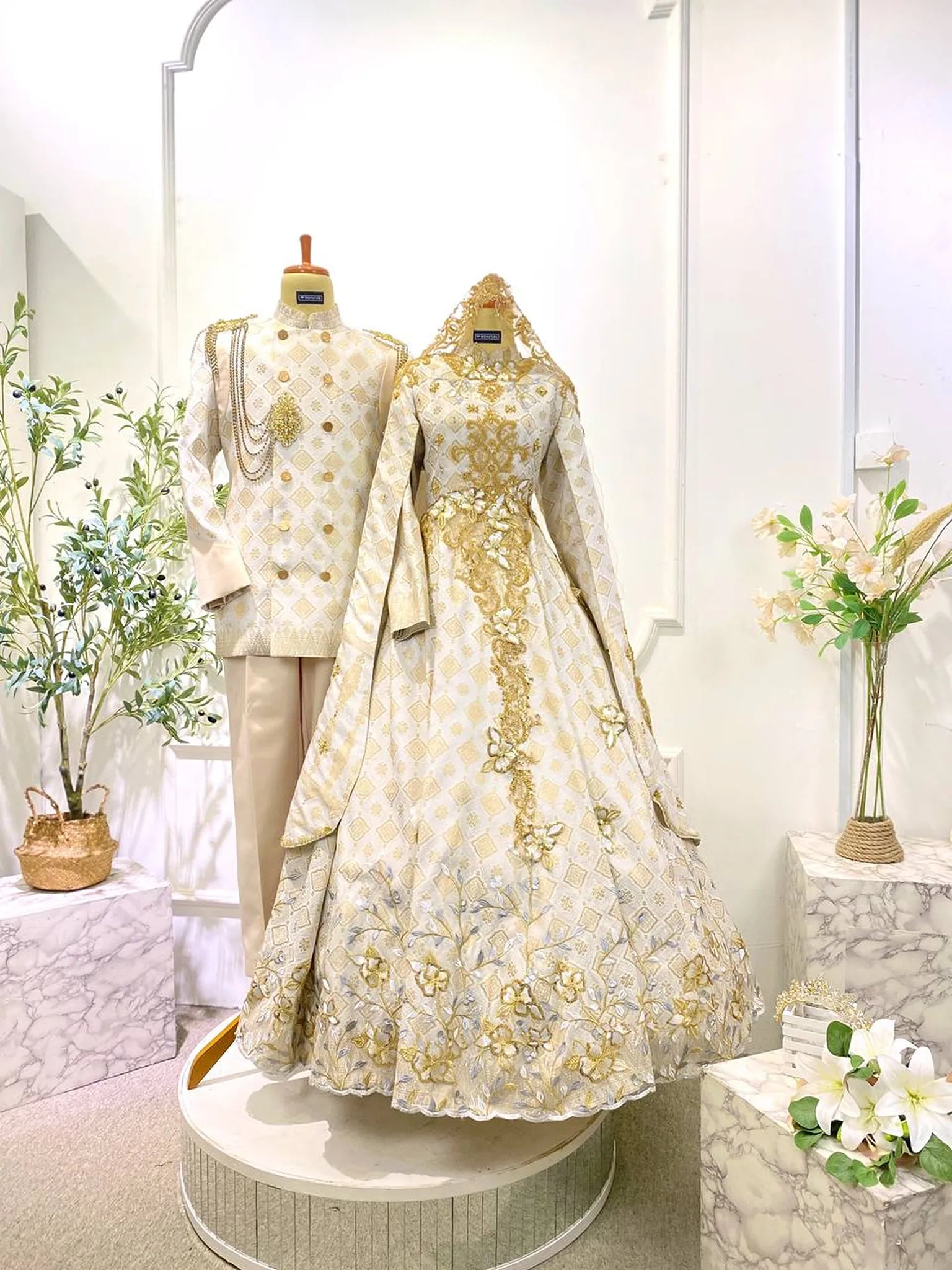 Couple in coordinated Baju Sanding with songket ballgown and Captain Suit ensemble-Baju Sanding Muslimah