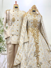 Close-up of cream gold Baju Pengantin couple with elegant lace details and traditional accessories-Sewa Baju Sanding