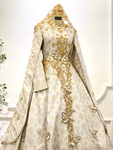 Upper detail of cream and gold bridal dress with duchess satin and songket texture-Pakej Perkahwinan