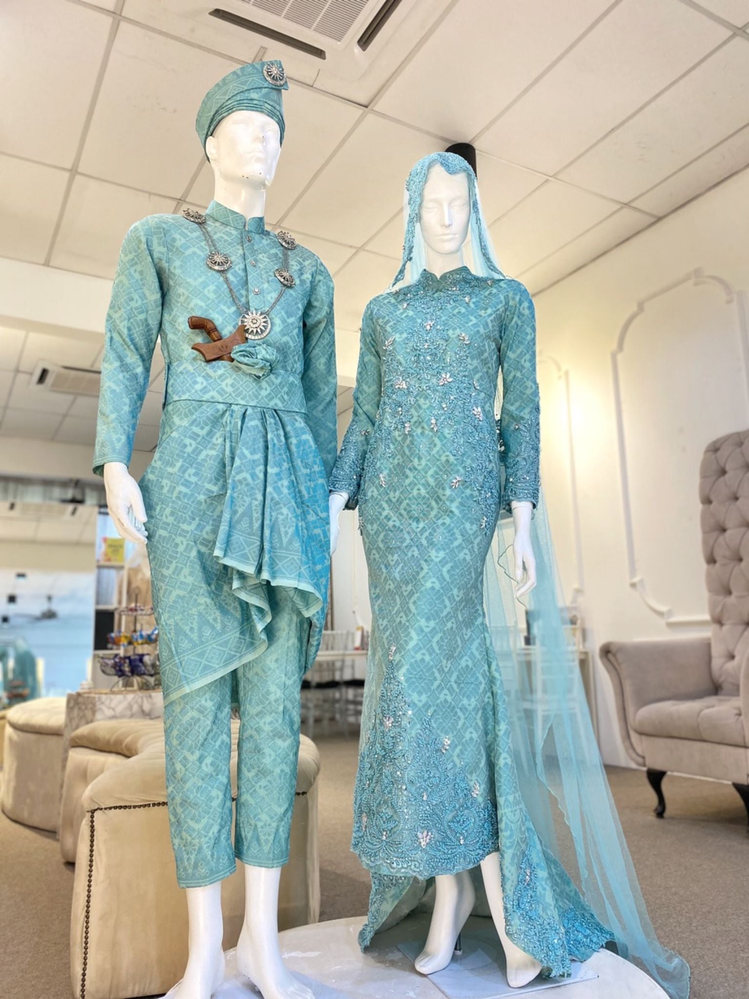 Tiffany is a stunning baby blue & turquoise songket 2D trumpet wedding dress that is perfect for the modern bride. With its elegant design and flattering fit, Tiffany is sure to turn heads on your big day. Made from luxurious songket 2D fabric, this dress is the perfect way to celebrate your special day.