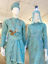 Tiffany is a stunning baby blue & turquoise songket 2D trumpet wedding dress that is perfect for the modern bride. With its elegant design and flattering fit, Tiffany is sure to turn heads on your big day. Made from luxurious songket 2D fabric, this dress is the perfect way to celebrate your special day.