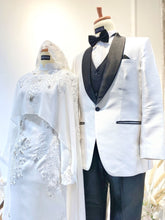 Introducing WARDAH's exquisite Baju Pengantin Off White Double Face Dress with Detachable Cape, priced at MYR 899.00. Tailored for the bride in sizes XS to M and the groom in sizes S to 2XL, both in a charming off-white hue. The bride's ensemble features a stylish dress with a detachable cape, while the groom dons the signature suit design. Crafted from premium double face material, this set, originally priced at RM1150, promises timeless elegance for your special day.