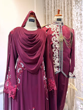 WARDINA offers a captivating Baju Pengantin ensemble in Maroon Burgundy, tailored for your wedding reception (Baju Sanding). The bride's attire features a graceful loose dress with an elegant shoulder cape, while grooms can choose between the classic Prince Suit or the traditional Kot Raihan 3-piece set. Crafted from luxurious chiffon material, this ensemble epitomizes sophistication and style, ensuring a memorable presence for both bride and groom on their special day.