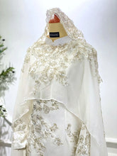 Close-up of satin bodice and cape connection showing smooth bridal finishing-Upper detail used for Sewa Baju Nikah shoppers comparing satin designs