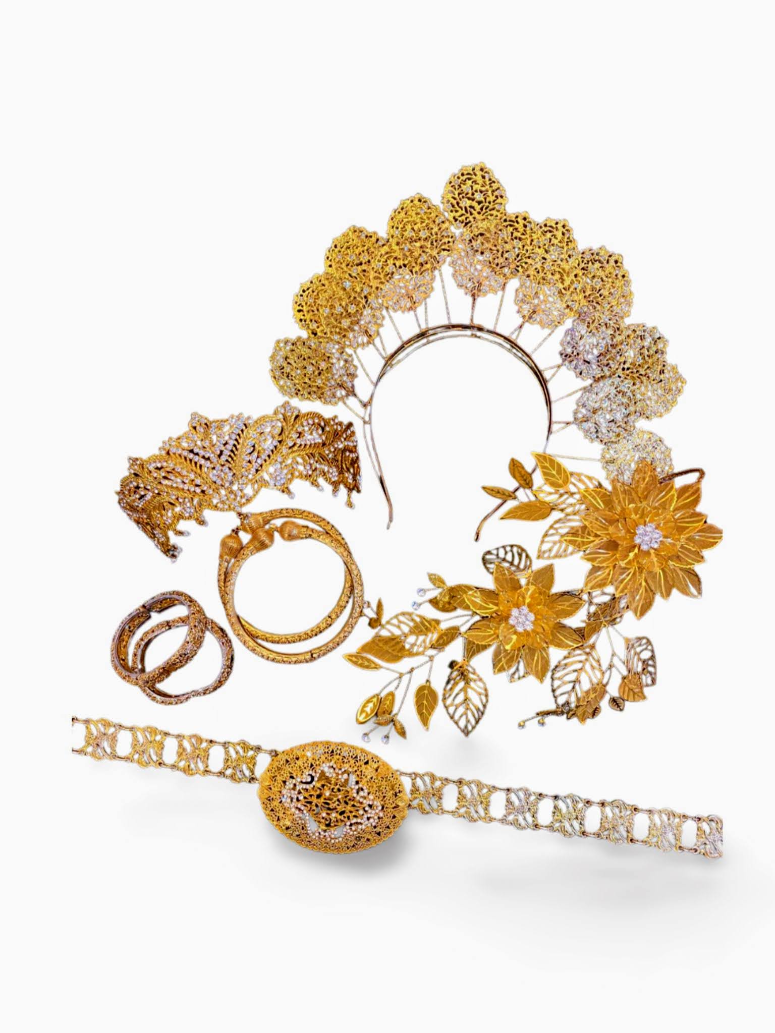 This image shows a selection of traditional Malay wedding accessories, including a Sanggul Lintang (a traditional Malay hair comb), Bunga Tangan Besi (a pair of metal bangles), Gelang Kaki (a pair of anklets), Gelang Tangan (a pair of bracelets), Tali Pinggang (a belt), and Pending (a brooch). These accessories are often worn by brides and grooms at Malay weddings, and they help to add a touch of traditional Malay culture to the wedding ceremony.