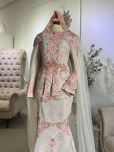 Songket fabric detail of SHELLY Baju Sanding - Light Peach & Cream Wedding Dress | Butik Pengantin