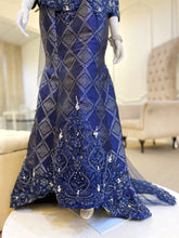 BETTY - Baju Pengantin Two-Piece Dress Navy Blue Songket with Beaded Lace Detailing. Modern and elegant baju pengantin with navy blue songket fabric, featuring delicate beaded lace detailing on the bodice. Perfect for a modern Malay wedding. Available for rent in Malaysia and Singapore.