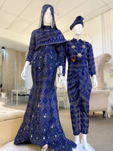 BETTY - Baju Pengantin Two-Piece Dress Navy Blue Songket with Beaded Lace Detailing. Modern and elegant baju pengantin with navy blue songket fabric, featuring delicate beaded lace detailing on the bodice. Perfect for a modern Malay wedding. Available for rent in Malaysia and Singapore.