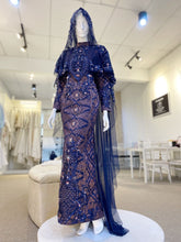 BLOSSOM EMPRESS - Baju Pengantin A-line Loose Dress Navy Blue and Dusty Pink Songket with Detachable Cape. Modern and elegant baju pengantin with navy blue songket fabric, featuring delicate beaded lace detailing on the bodice. Perfect for a modern Malay wedding. Available for rent in Malaysia and Singapore..