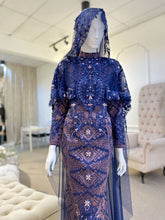 BLOSSOM EMPRESS - Baju Pengantin A-line Loose Dress Navy Blue and Dusty Pink Songket with Detachable Cape. Modern and elegant baju pengantin with navy blue songket fabric, featuring delicate beaded lace detailing on the bodice. Perfect for a modern Malay wedding. Available for rent in Malaysia and Singapore..