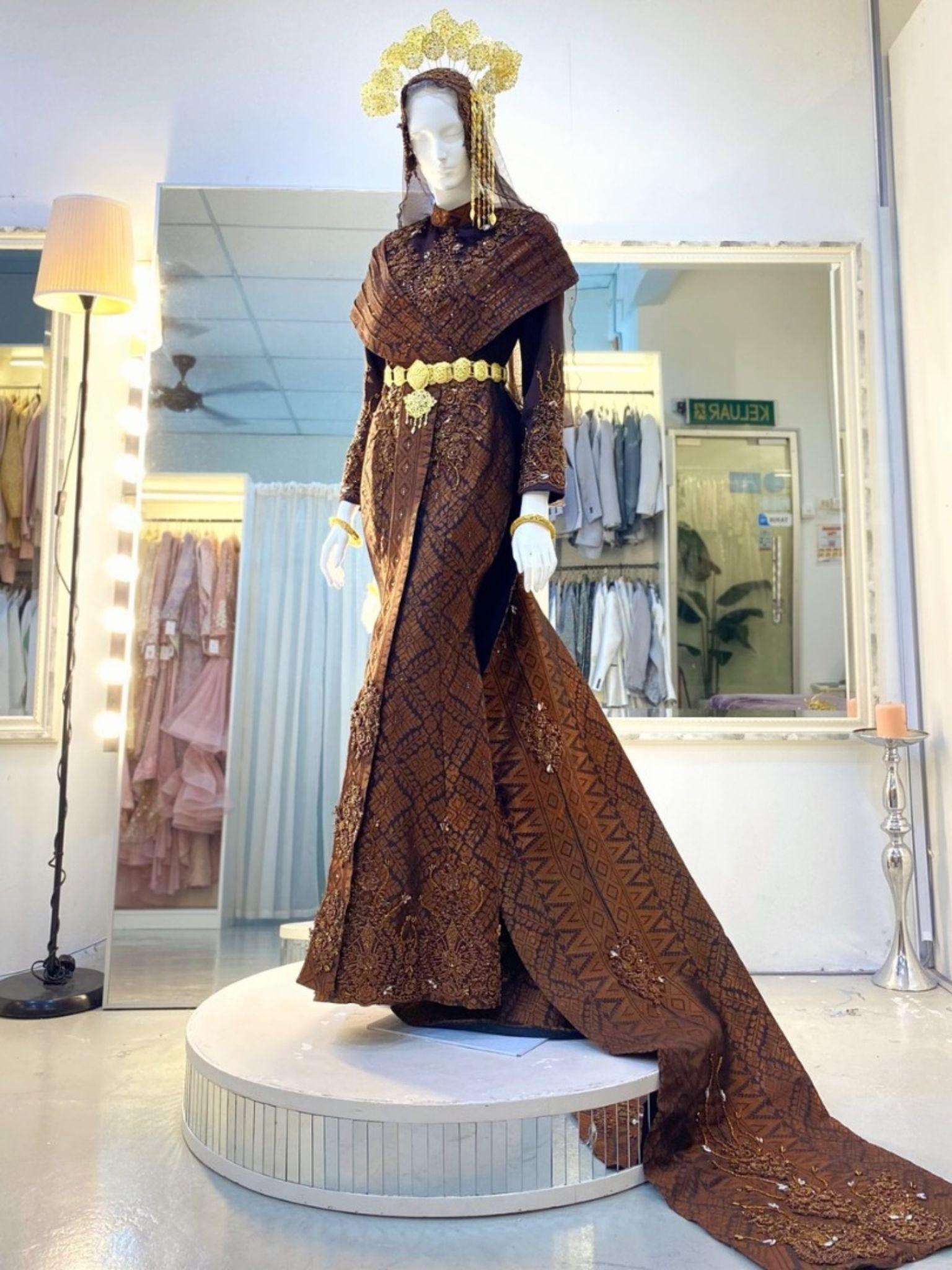 CIK SITI WAN KEMBANG - Dress Songket Wedding Dress, Dark Brown and Bronze from PP Signature Bridal Boutique. Tempah Baju Pengantin online-sewa baju pengantin online