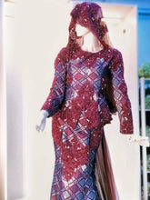 Sepasang Baju Pengantin Dress with trail songket dan kot raihan lengkap aksesori oleh Butik Pengantin PP Signature dipakai patung Lelaki dan perempuan berwarna merah maroon untuk disewa-A pair of Songket Dress With Trail wedding dresses as well as Raihan Coat complete with accessories by PP Signature Bridal Boutique worn by male and female statues in maroon for rent