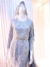 sepasang baju pengantin, Trumpet dress berwarna kelabu perak dengan renda penuh lengkap aksesori buatan Butik Pengantin PP Signature-a pair of wedding dresses, Trumpet Dress in silver gray with full lace complete with accessories by PP Signature Bridal Boutique