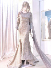 sepasang baju pengantin songket, Trumpet dress berwarna kelabu cair lengkap aksesori buatan Butik Pengantin PP Signature-a pair of Songket wedding dresses, Trumpet Dress in light gray complete with accessories by PP Signature Bridal Boutique