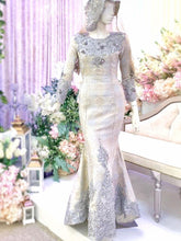 sepasang baju pengantin songket, Trumpet dress berwarna perak dan emas cair lengkap aksesori buatan Butik Pengantin PP Signature-a pair of songket wedding dresses, Trumpet Dress in silver and light gold complete with accessories by PP Signature Bridal Boutique