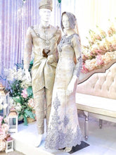 sepasang baju pengantin songket, Trumpet dress berwarna perak dan emas cair lengkap aksesori buatan Butik Pengantin PP Signature-a pair of songket wedding dresses, Trumpet Dress in silver and light gold complete with accessories by PP Signature Bridal Boutique