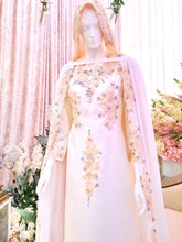Sepasang baju pengantin, Loose Dress with detachable cape berwarna putih lengkap aksesori buatan Butik Pengantin PP Signature-a pair of wedding dresses, a Loose cutting Dress with detachable cape in off white complete with accessories by PP Signature Bridal Boutique